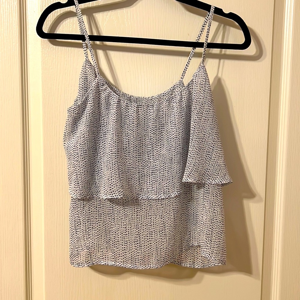 Adorable lightweight polkadot blouse.